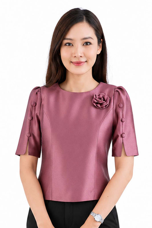 Ladies authentic Thai silk blouse for women with elegant half sleeves, round neckline, decorative fabric-covered buttons, floral brooch detail and a tailored fitted silhouette. Paired with a traditional Thai patterned sarong skirt, this classic Thai formal outfit is perfect for weddings, temple visits, cultural ceremonies, festivals, receptions and special occasions. Amazon Etsy eBay Siam Regal