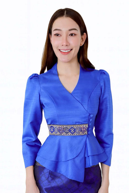 Ladies authentic Thai silk blouse for women with elegant long sleeves, V-neck wrap-style neckline, decorative fabric-covered buttons, traditional Thai woven waist trim and layered peplum hem. Tailored fitted silhouette inspired by classic Thai clothing, perfect for weddings, temple visits, cultural ceremonies, festivals, formal events and special occasions. Amazon Etsy eBay Siam Regal