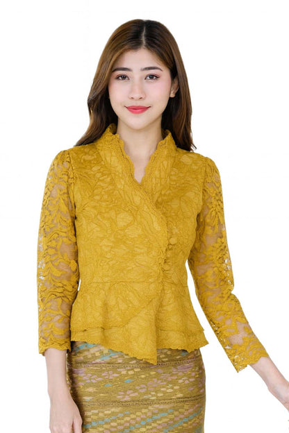 Ladies authentic Thai lace blouse for women featuring elegant floral lace, long sleeves, scalloped high neckline, wrap-style design, decorative fabric-covered buttons, peplum waist and tailored fitted silhouette. Paired with a traditional Thai patterned sarong skirt, this classic Thai outfit is perfect for weddings, temple visits, cultural ceremonies, festivals, formal events and special occasions. Amazon Etsy eBay Siam Regal