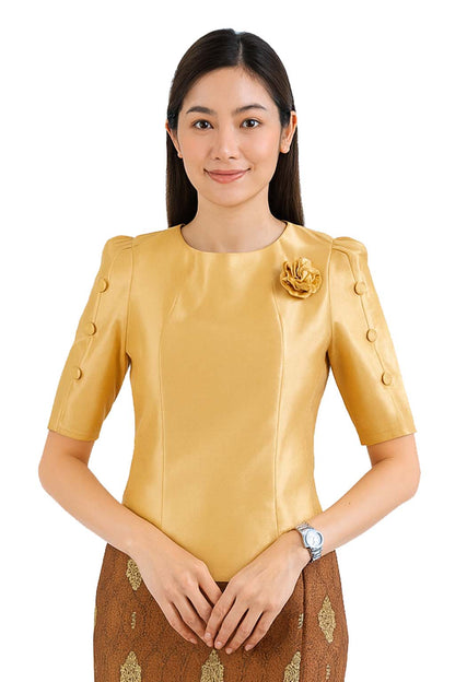 Ladies authentic Thai silk blouse for women with elegant half sleeves, round neckline, decorative fabric-covered buttons, floral brooch detail and a tailored fitted silhouette. Paired with a traditional Thai patterned sarong skirt, this classic Thai formal outfit is perfect for weddings, temple visits, cultural ceremonies, festivals, receptions and special occasions. Amazon Etsy eBay Siam Regal