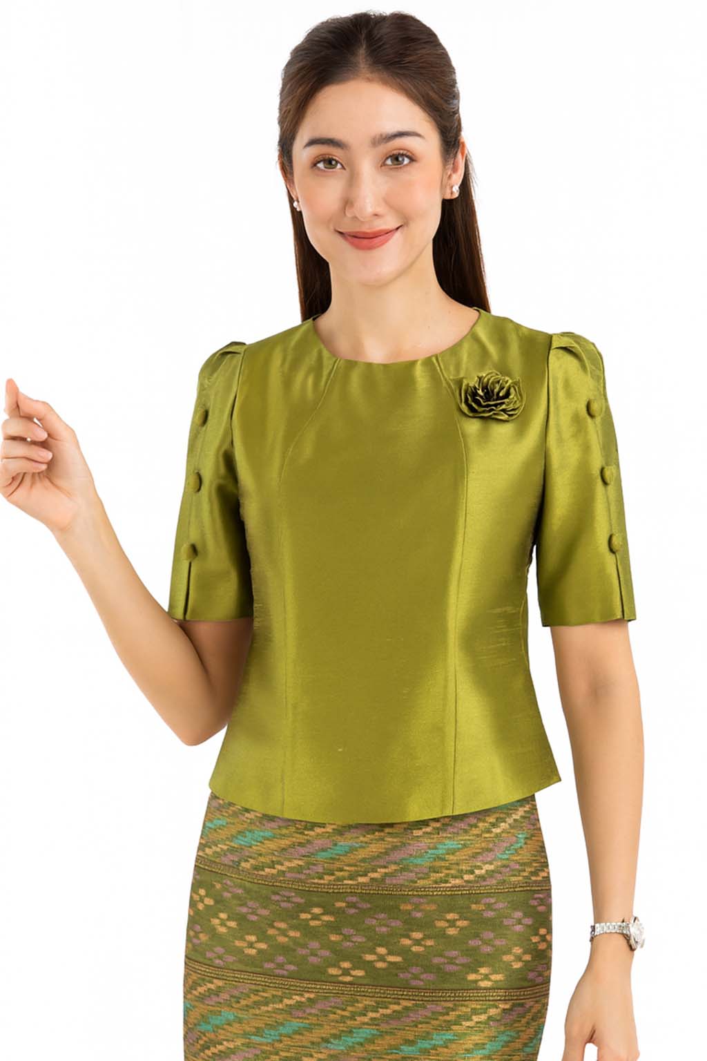 Ladies authentic Thai silk blouse for women with elegant half sleeves, round neckline, decorative fabric-covered buttons, floral brooch detail and a tailored fitted silhouette. Paired with a traditional Thai patterned sarong skirt, this classic Thai formal outfit is perfect for weddings, temple visits, cultural ceremonies, festivals, receptions and special occasions. Amazon Etsy eBay Siam Regal