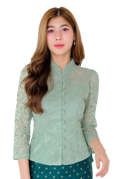 Ladies authentic Thai lace blouse for women featuring elegant floral lace, long sleeves, Mandarin collar, traditional fabric-covered buttons and a tailored fitted silhouette. Paired with a traditional Thai patterned sarong skirt, this classic Thai formal outfit is perfect for weddings, temple visits, cultural ceremonies, festivals, receptions and special occasions. Amazon Etsy eBay Siam Regal