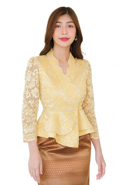 Ladies authentic Thai lace blouse for women featuring elegant floral lace, long sleeves, scalloped high neckline, wrap-style design, decorative fabric-covered buttons, peplum waist and tailored fitted silhouette. Paired with a traditional Thai patterned sarong skirt, this classic Thai outfit is perfect for weddings, temple visits, cultural ceremonies, festivals, formal events and special occasions. Amazon Etsy eBay Siam Regal