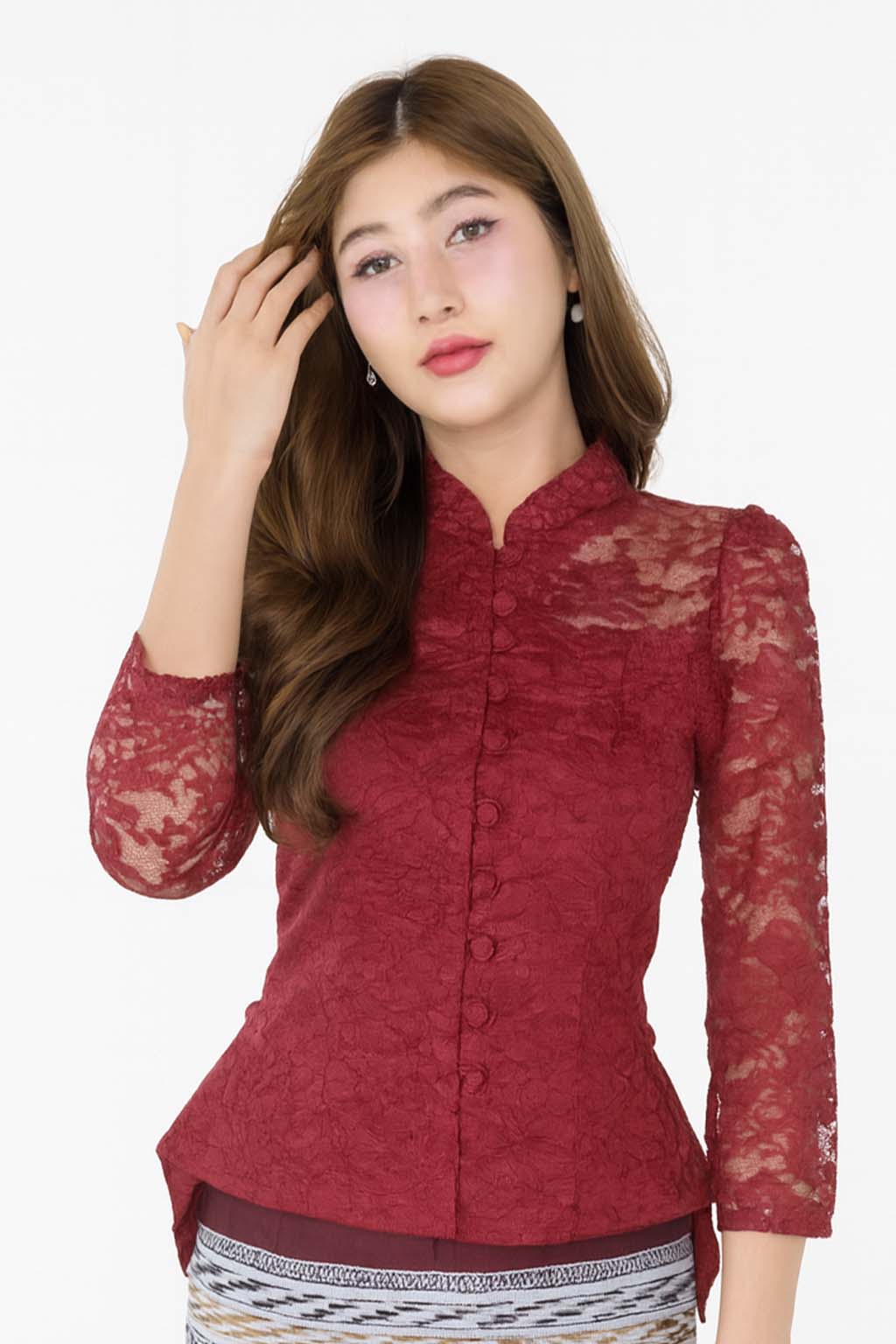 Ladies authentic Thai lace blouse for women featuring elegant floral lace, long sleeves, Mandarin collar, traditional fabric-covered buttons and a tailored fitted silhouette. Paired with a traditional Thai patterned sarong skirt, this classic Thai formal outfit is perfect for weddings, temple visits, cultural ceremonies, festivals, receptions and special occasions. Amazon Etsy eBay Siam Regal
