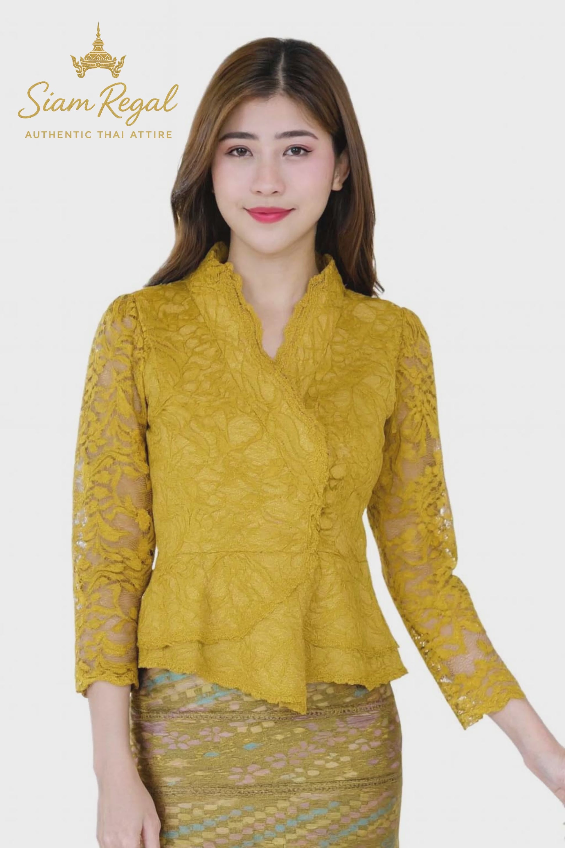 Ladies authentic Thai lace blouse for women featuring elegant floral lace, long sleeves, scalloped high neckline, wrap-style design, decorative fabric-covered buttons, peplum waist and tailored fitted silhouette. Paired with a traditional Thai patterned sarong skirt, this classic Thai outfit is perfect for weddings, temple visits, cultural ceremonies, festivals, formal events and special occasions. Amazon Etsy eBay Siam Regal