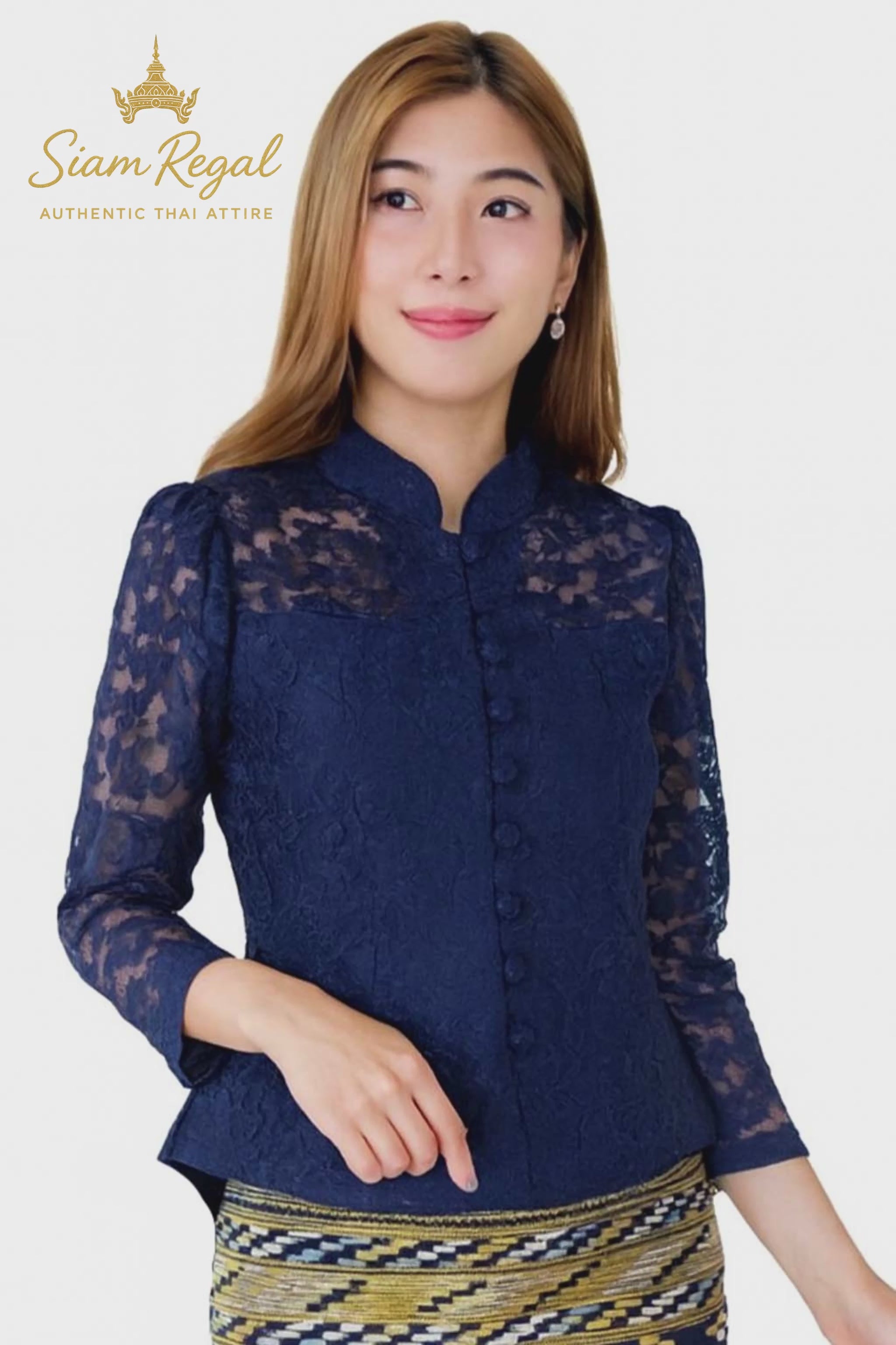 Ladies authentic Thai lace blouse for women featuring elegant floral lace, long sleeves, Mandarin collar, traditional fabric-covered buttons and a tailored fitted silhouette. Paired with a traditional Thai patterned sarong skirt, this classic Thai formal outfit is perfect for weddings, temple visits, cultural ceremonies, festivals, receptions and special occasions. Amazon Etsy eBay Siam Regal
