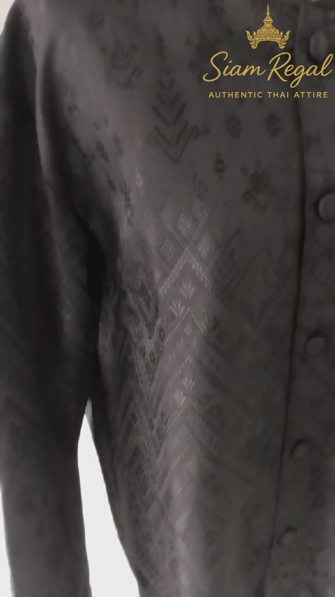Men's black traditional Thai formal jacket with Mandarin collar, textured pattern and long sleeves, ideal for Thai weddings and cultural ceremonies.