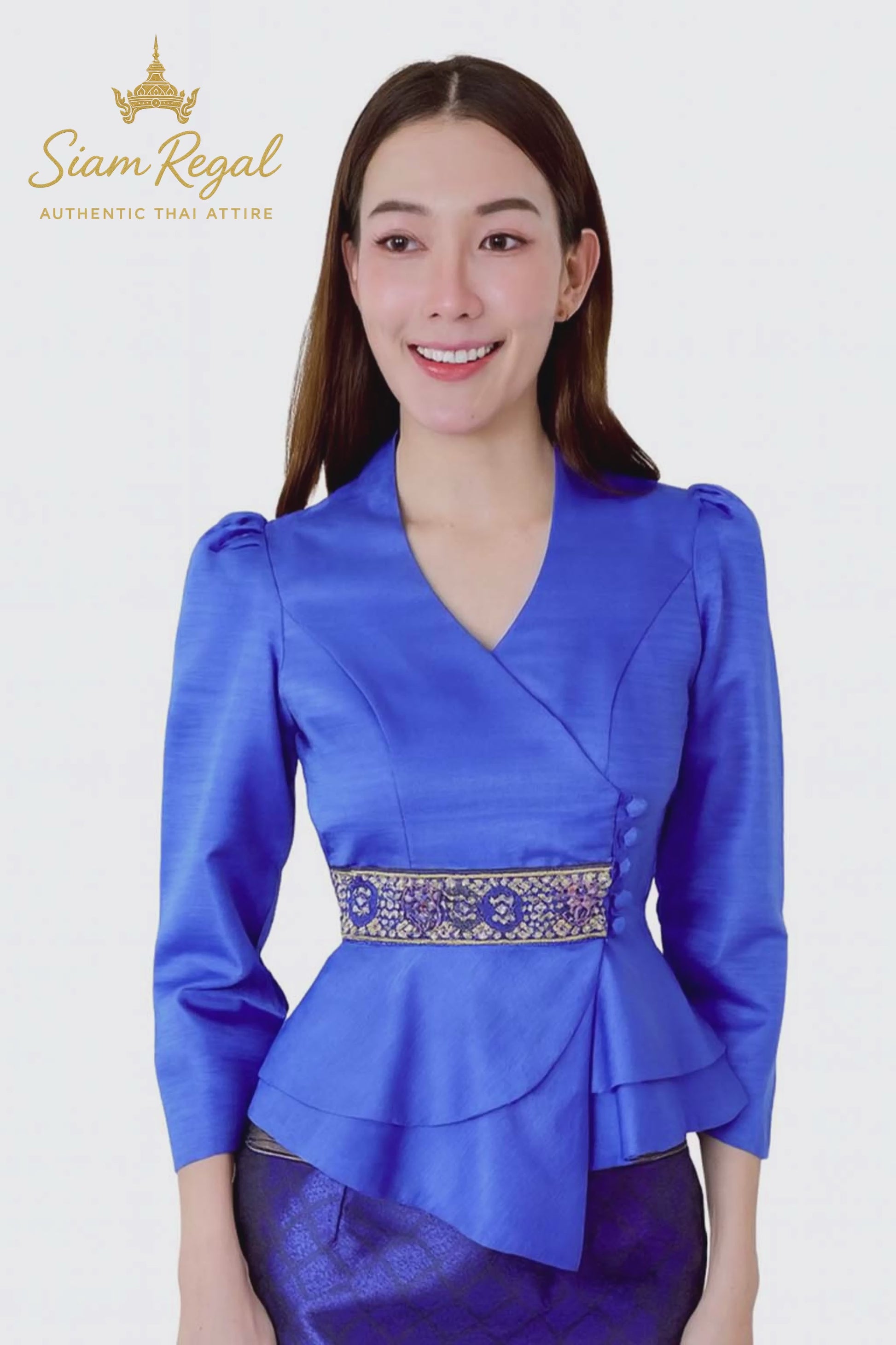 Ladies authentic Thai silk blouse for women with elegant long sleeves, V-neck wrap-style neckline, decorative fabric-covered buttons, traditional Thai woven waist trim and layered peplum hem. Tailored fitted silhouette inspired by classic Thai clothing, perfect for weddings, temple visits, cultural ceremonies, festivals, formal events and special occasions. Amazon Etsy eBay Siam Regal